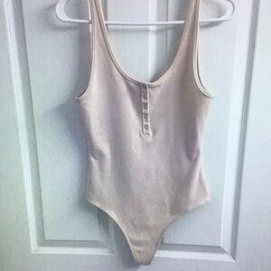 Stylish Cream Bodysuit with Button Accents
